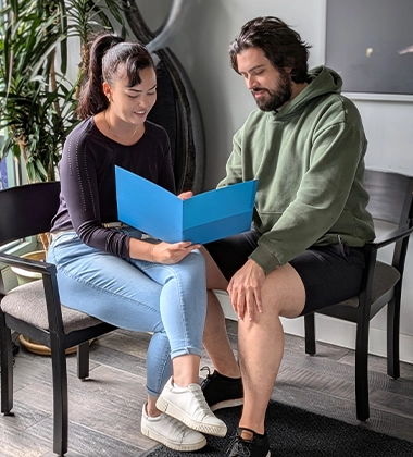 Chiropractor San Francisco CA Kate Russell Consulting With Patient Kate Russell Consulting With Patient
